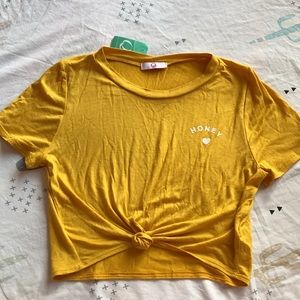 Women’s crop top w/ lettering on the side.